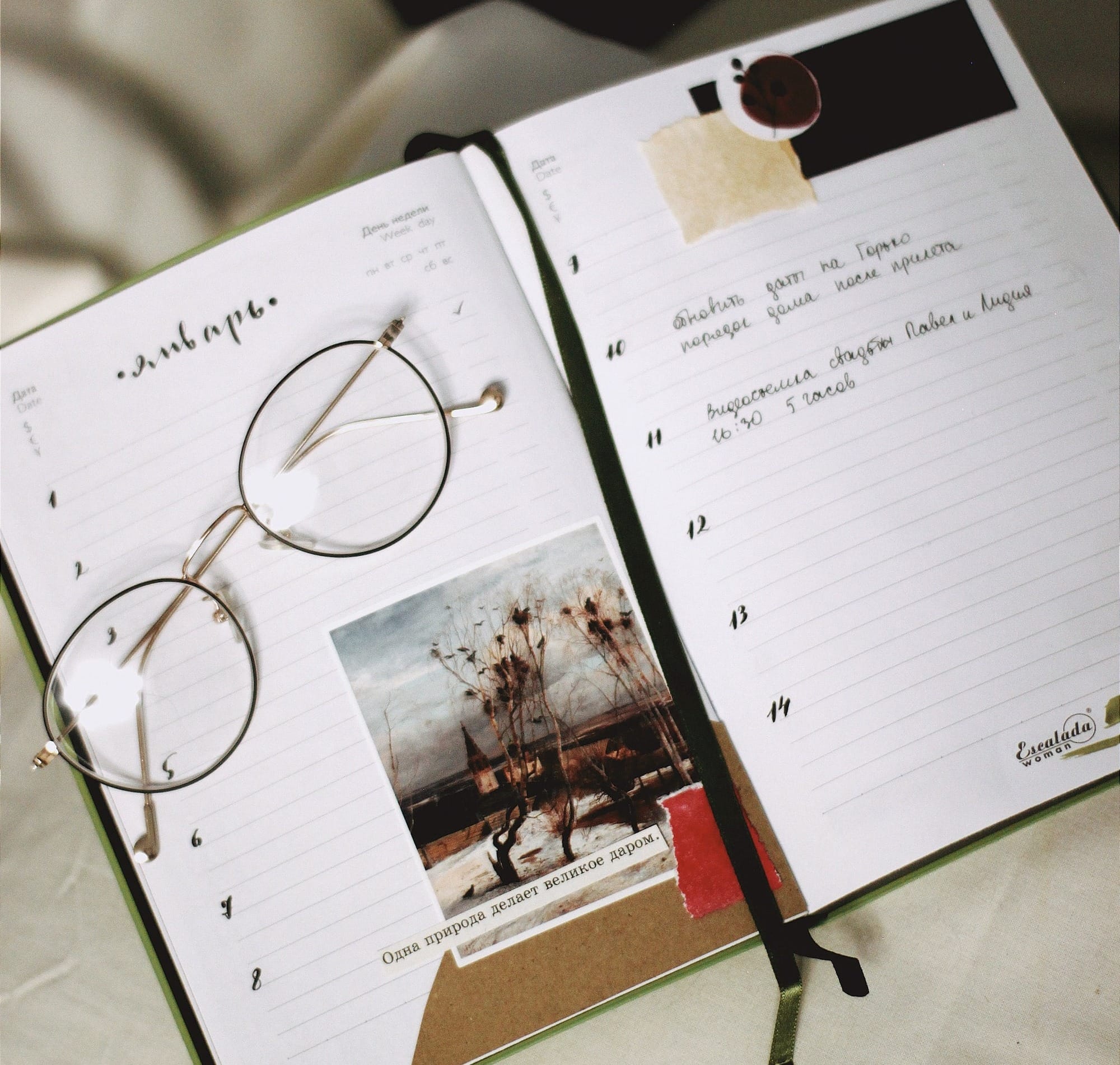 silver framed eyeglasses on book page