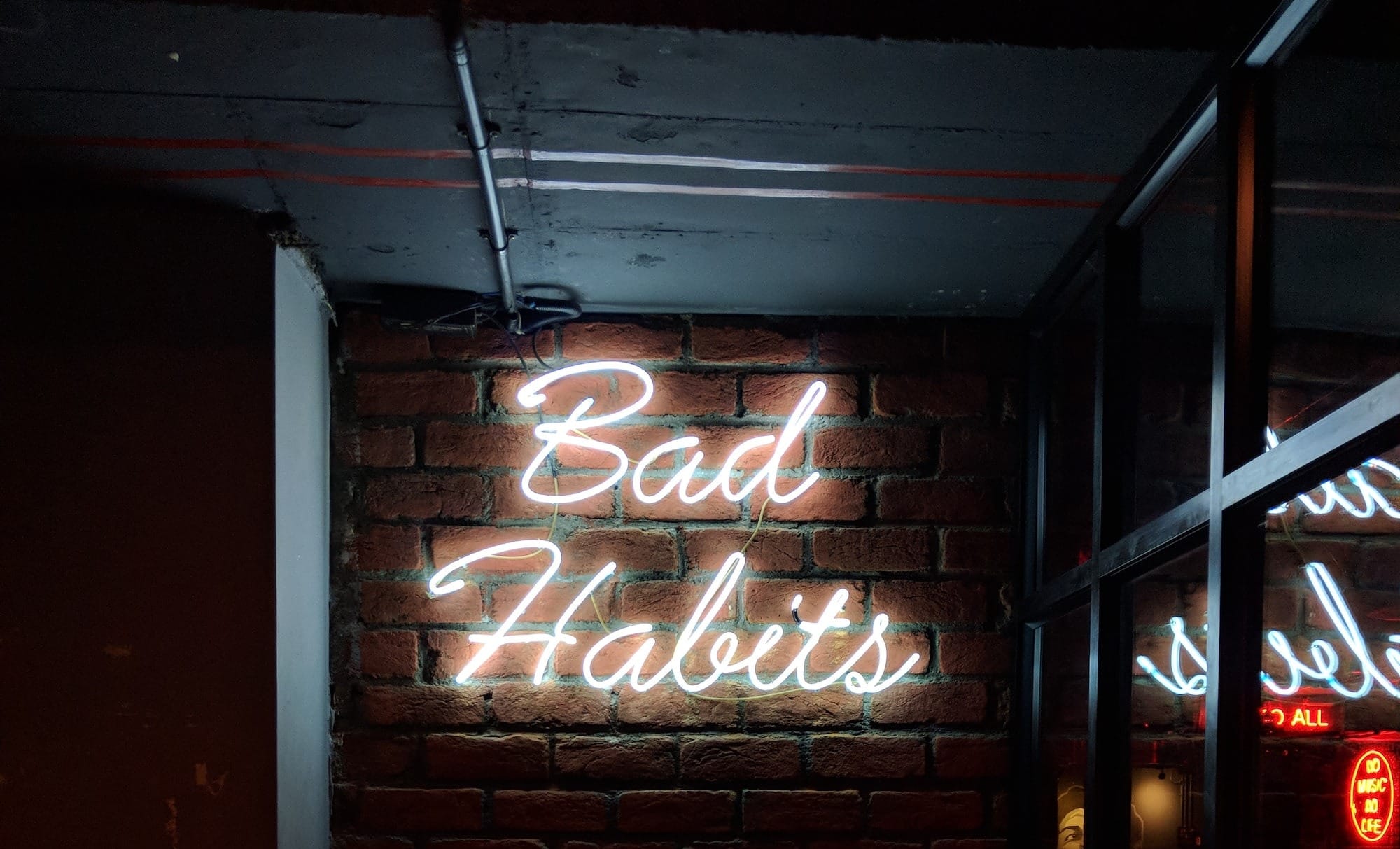 white bad habits LED signage
